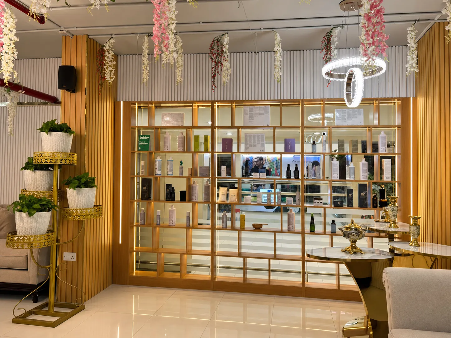 Premium product display and salon lounge at Mubazzara